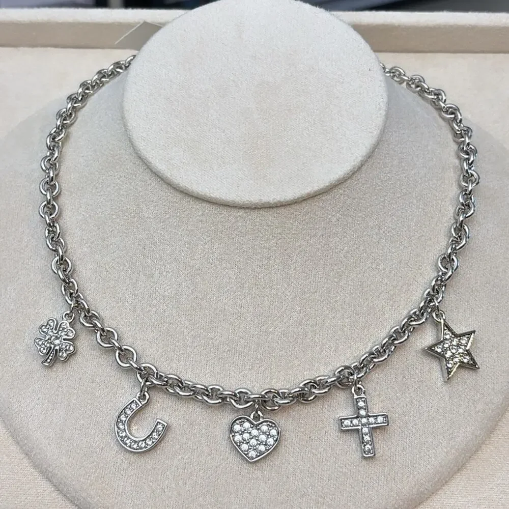 Nina Ricci Rhodium Plated Crystal Charm Necklace Heart Cross Star Horseshoe - Picture 1 of 4